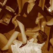 dominating her man at a party