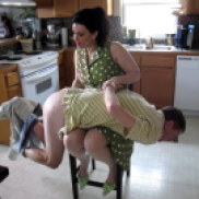 spanking her husband in the kitchen